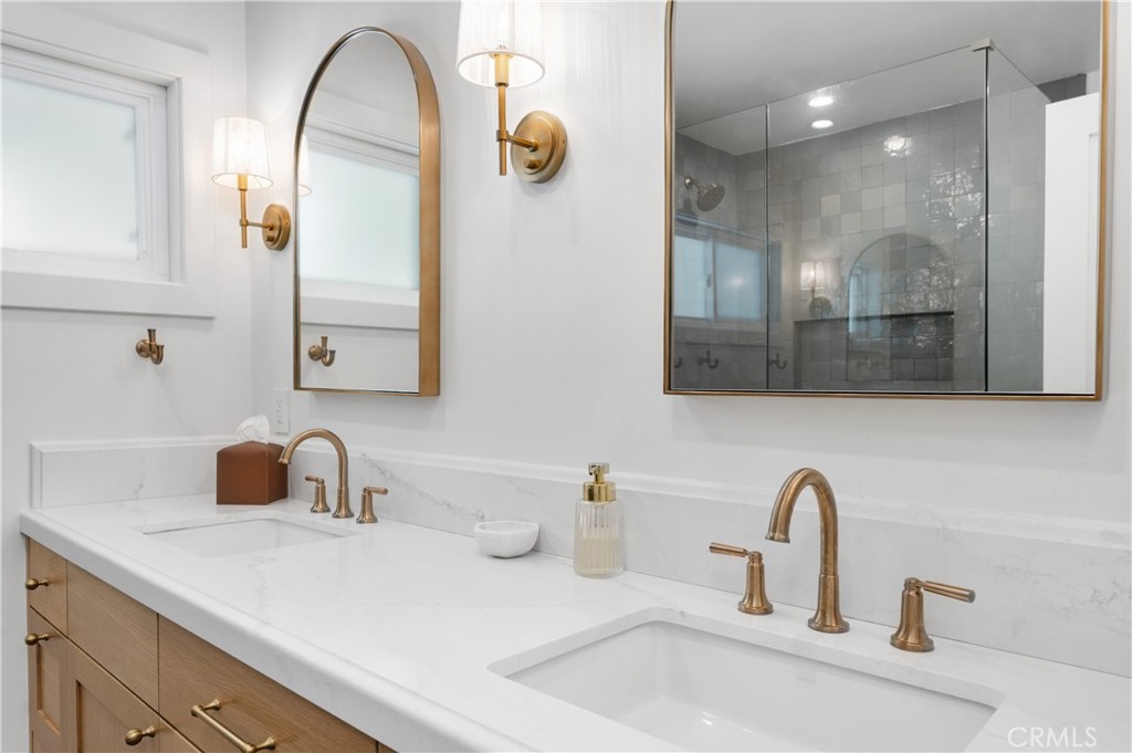 1805 Arriba Linda San Clemente, CA 92672 - Photo 30 of 50 a bathroom with a sink and a mirror