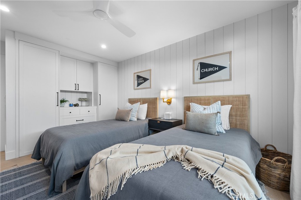 1805 Arriba Linda San Clemente, CA 92672 - Photo 33 of 50 a bedroom with a large bed and a lamp