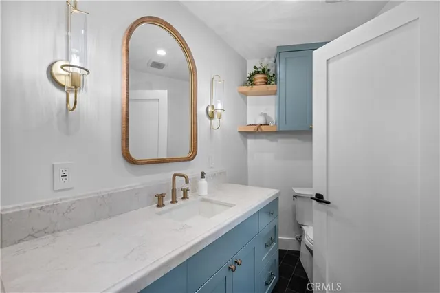 a view of a hallway with closet area