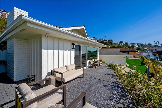 a backyard of a house with seating space