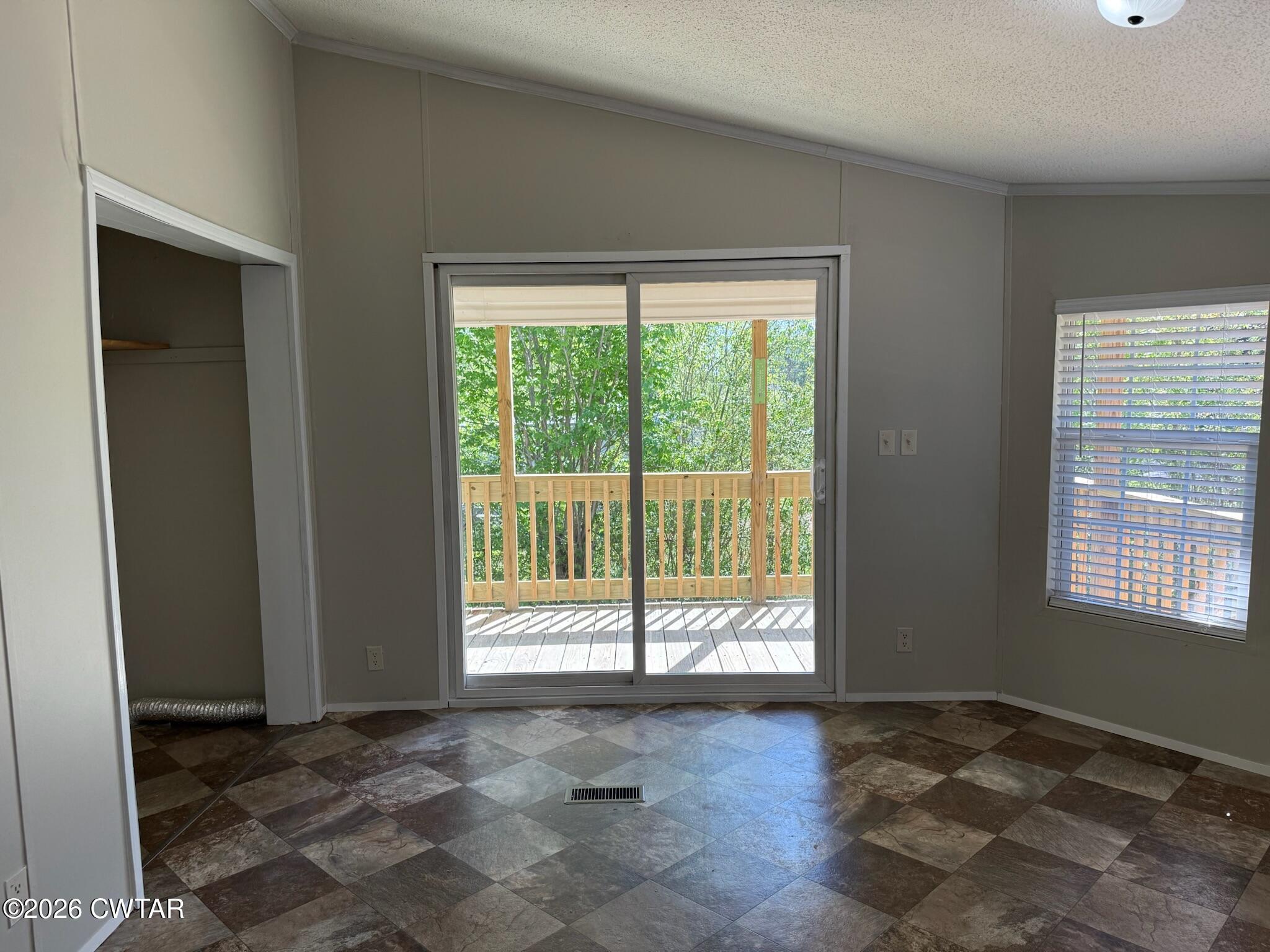 226 Massey Street Adamsville, TN 38310 - Photo 11 of 28 a view of an empty room and window