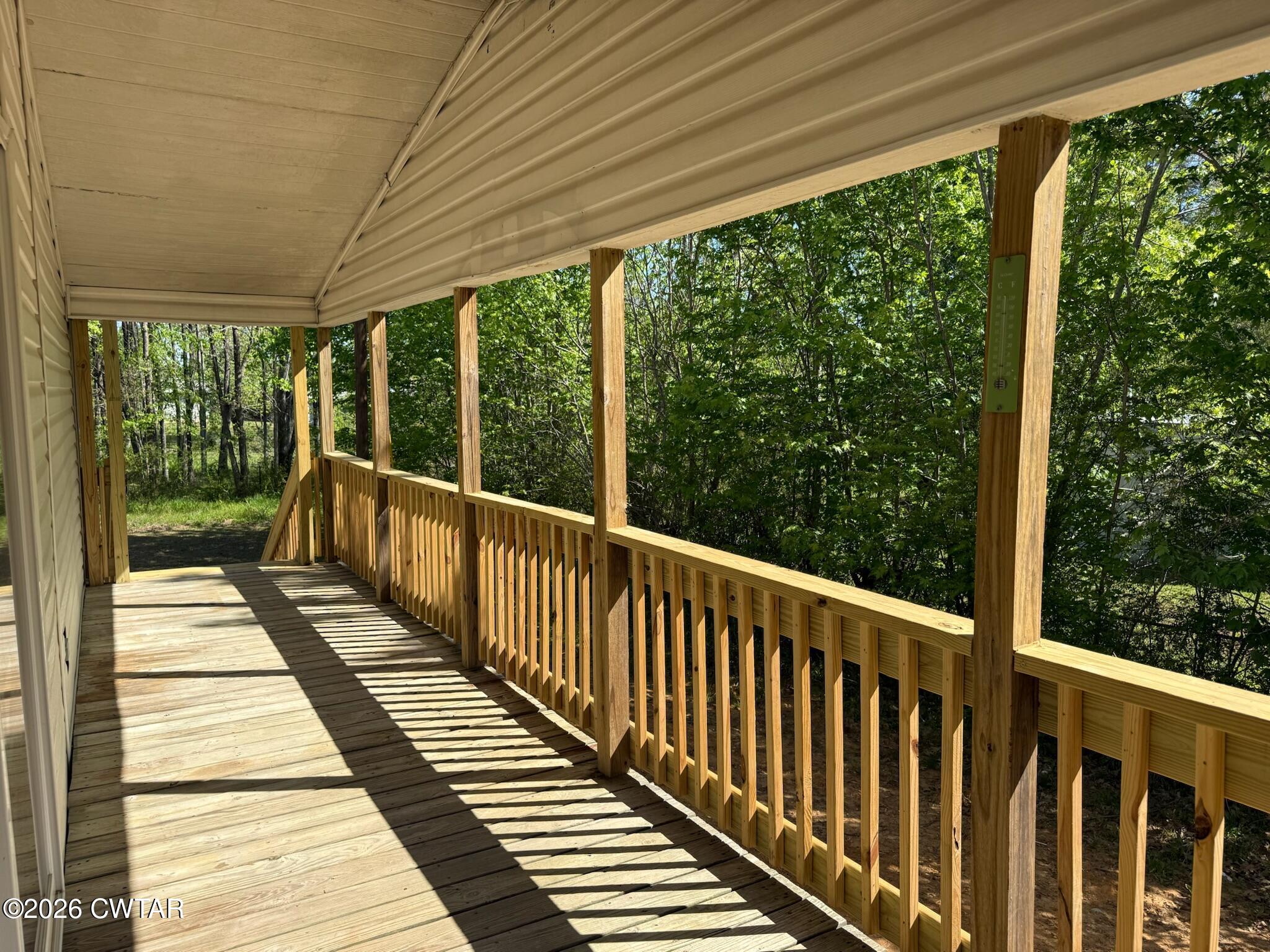 226 Massey Street Adamsville, TN 38310 - Photo 25 of 28 a view of a balcony with wooden floor