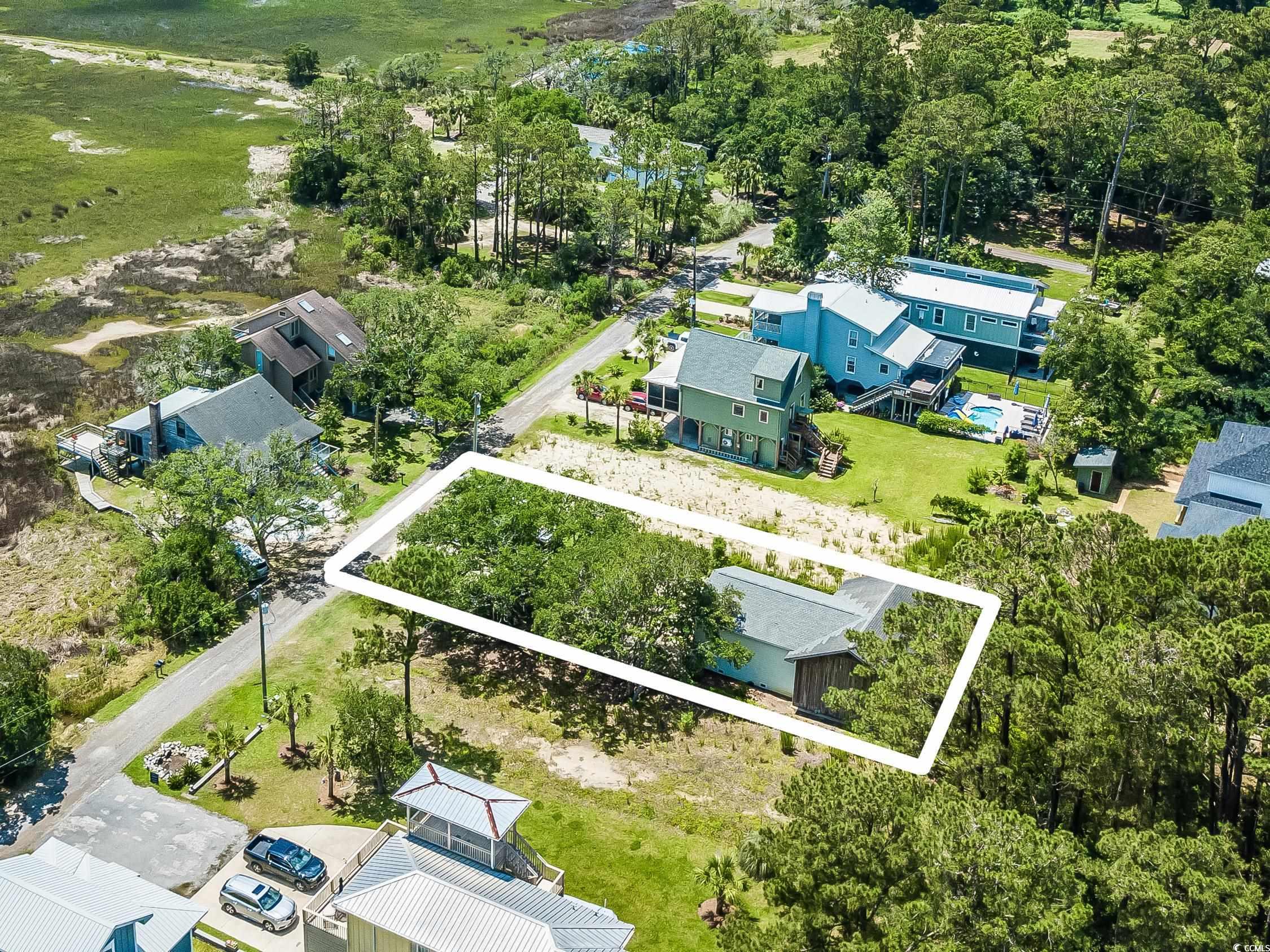 127 Brown Pelican Loop Pawleys Island, SC 29585 - Photo 22 of 31 Aerial overview of property's location with property parcel outlined