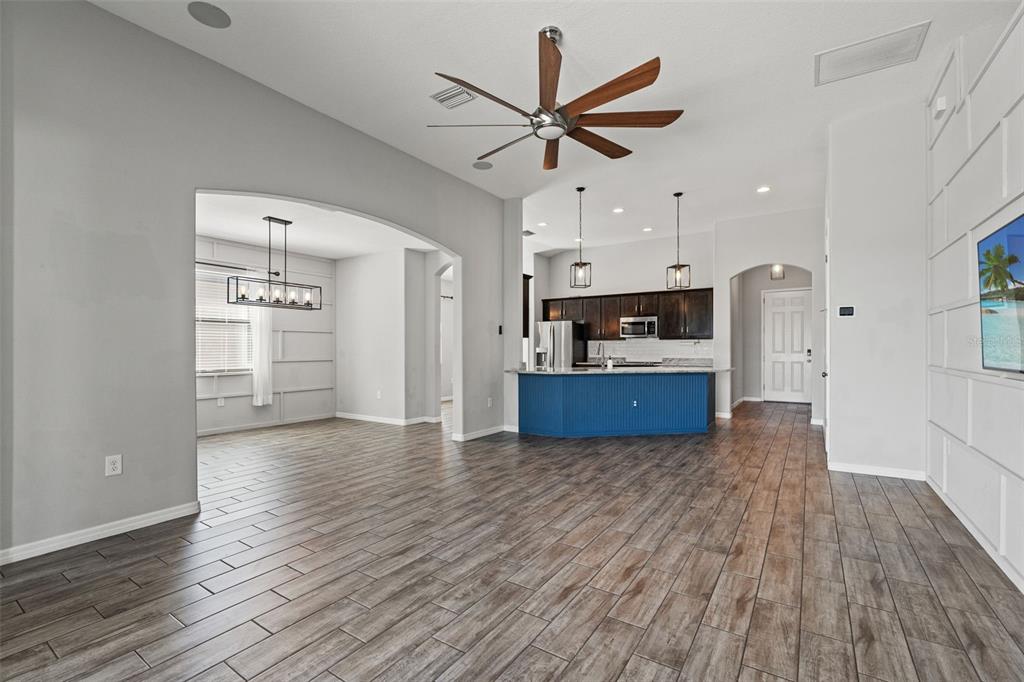 335 Old Windsor Way Spring Hill, FL 34609 - Photo 17 of 41 a view of kitchen with cabinets and wooden floor