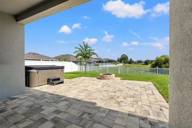 a view of a terrace with a garden