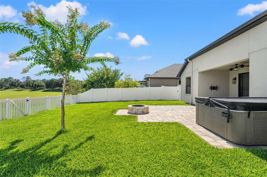 335 Old Windsor Way Spring Hill, FL 34609 - Photo 39 of 41 a view of a backyard with swimming pool