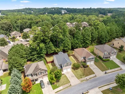 an aerial view of residential house with outdoor space
