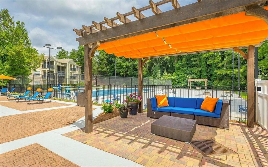 3780 Towne Crossing, Unit 511E Kennesaw, GA 30144 - Photo 10 of 12 a outdoor view with a sitting space