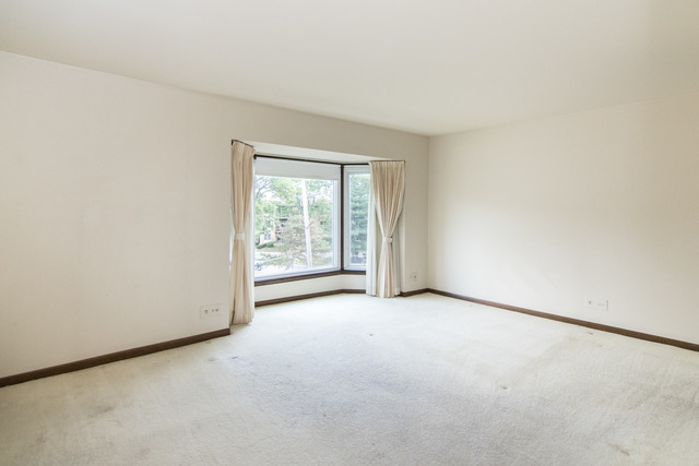 200 Thames Parkway, Unit 3G Park Ridge, IL 60068 - Photo 13 of 20 an empty room with windows