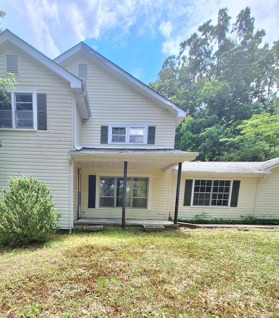 333 Lickskillet Road Epworth, GA 30541 - Photo 1 of 32 a front view of a house with a garden