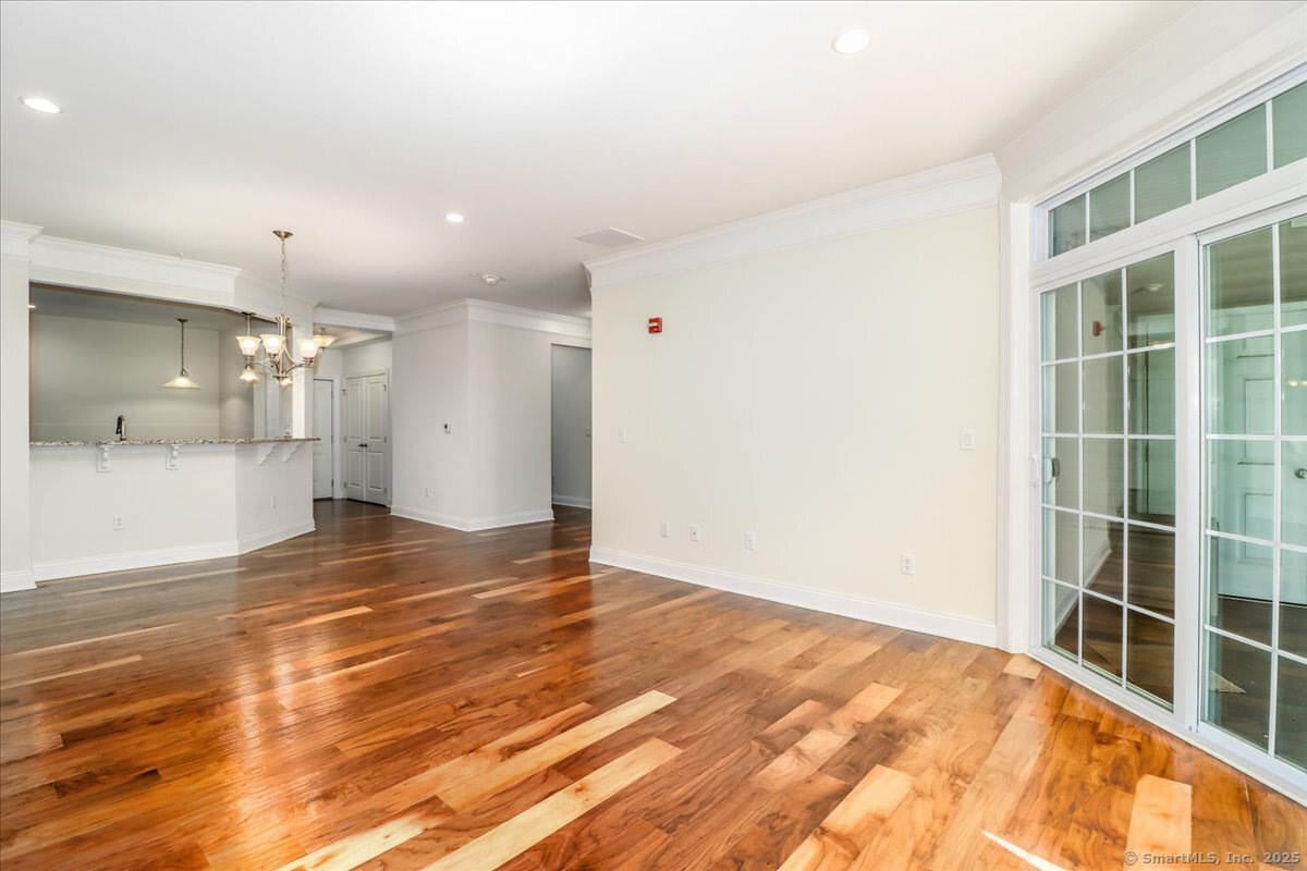 603 Brookside Court, Unit 603 Newtown, CT 06470 - Photo 13 of 40 View from living room to entry