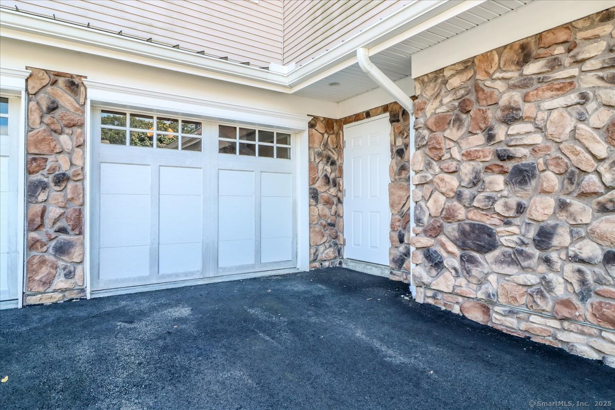 603 Brookside Court, Unit 603 Newtown, CT 06470 - Photo 30 of 40 Garage