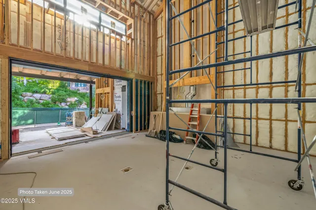 a view of a kitchen with washer and dryer