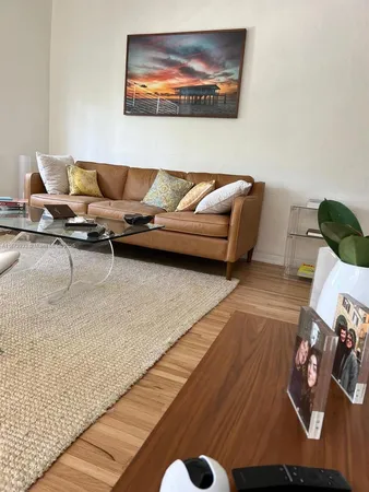 a living room with furniture and a couch