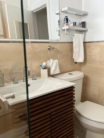 a bathroom with a sink and a toilet