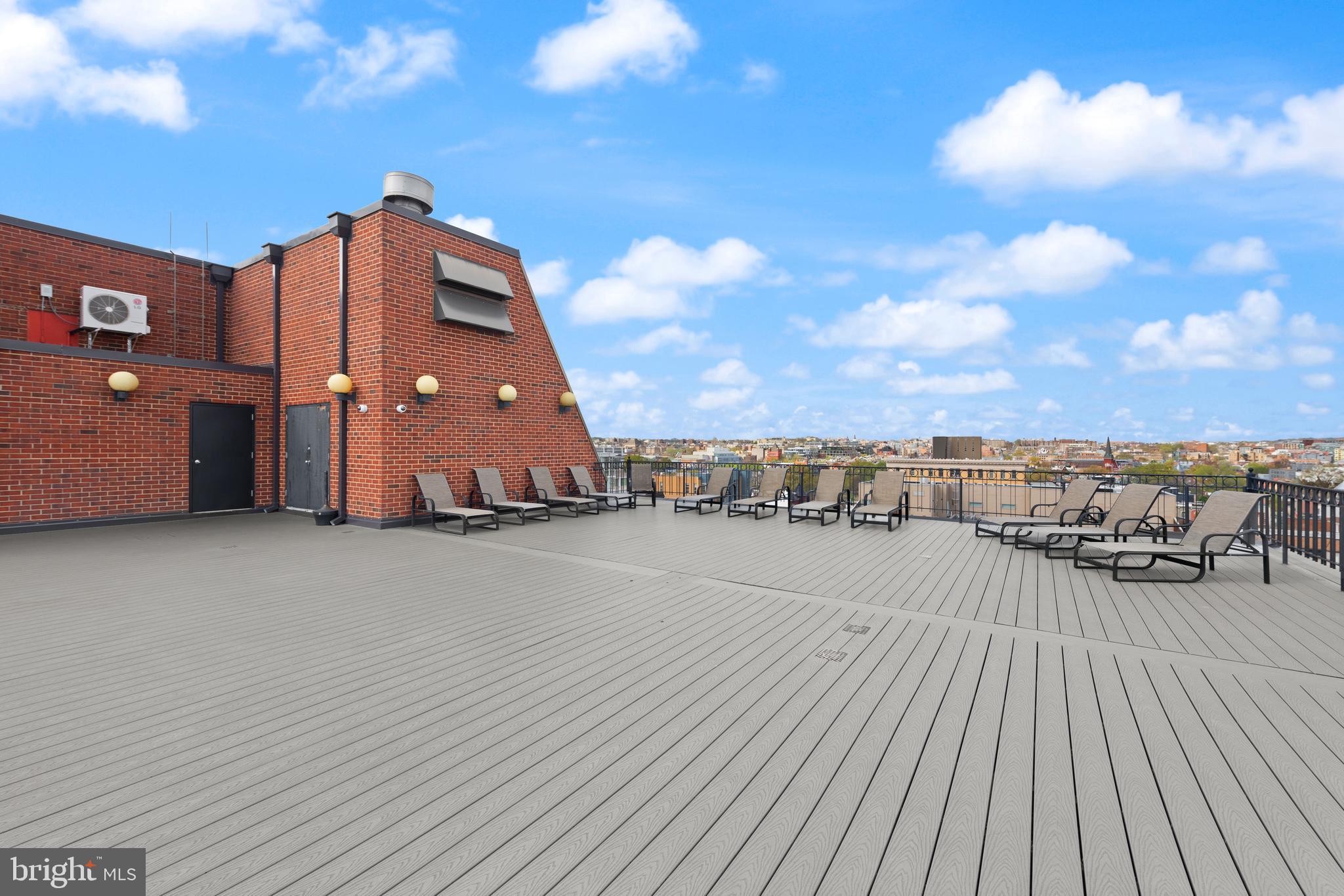 1245 13th Street Northwest, Unit 516 Washington, DC 20005 - Photo 23 of 25 a view of a terrace with a bench