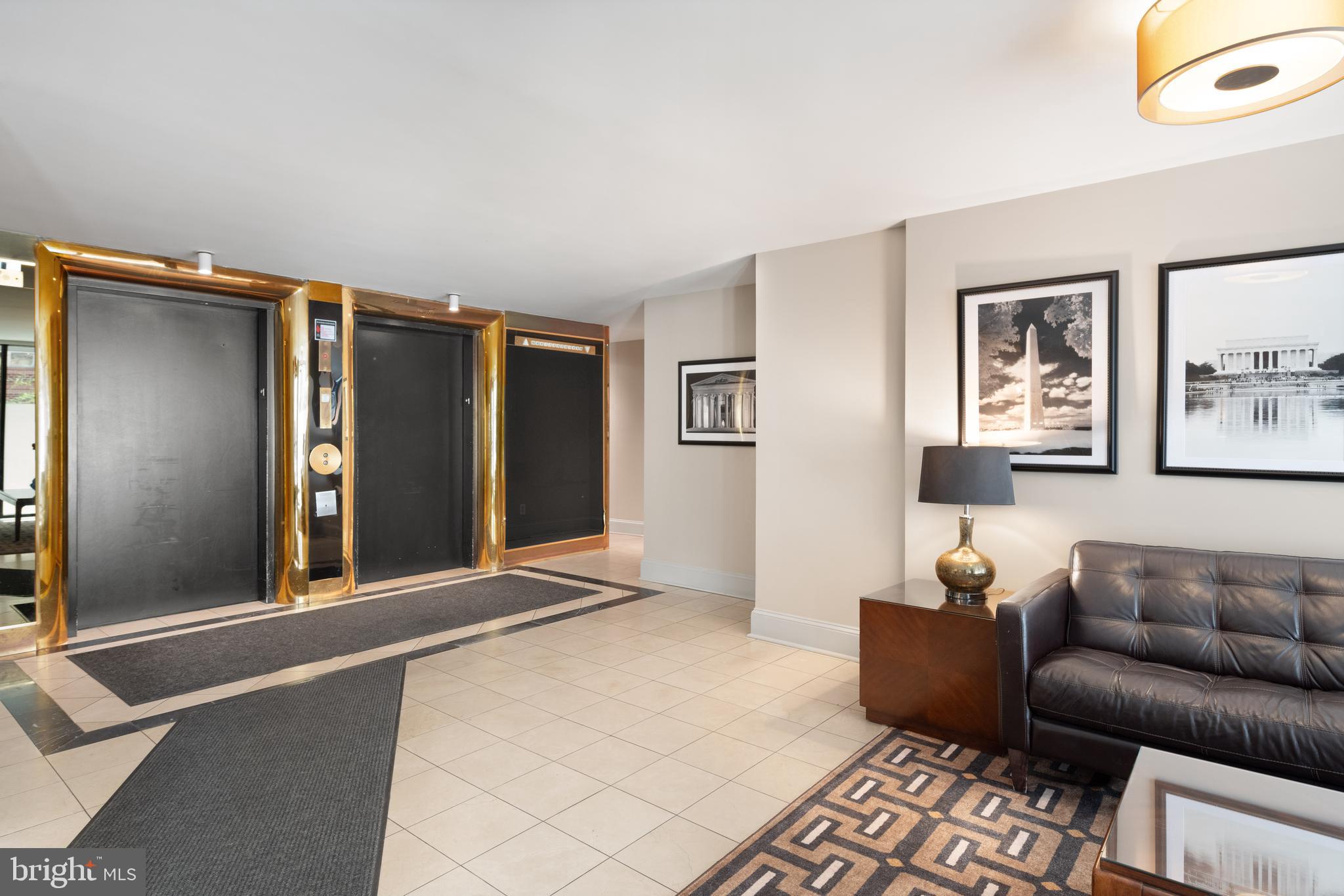 1245 13th Street Northwest, Unit 516 Washington, DC 20005 - Photo 6 of 25 a living room with furniture and a window
