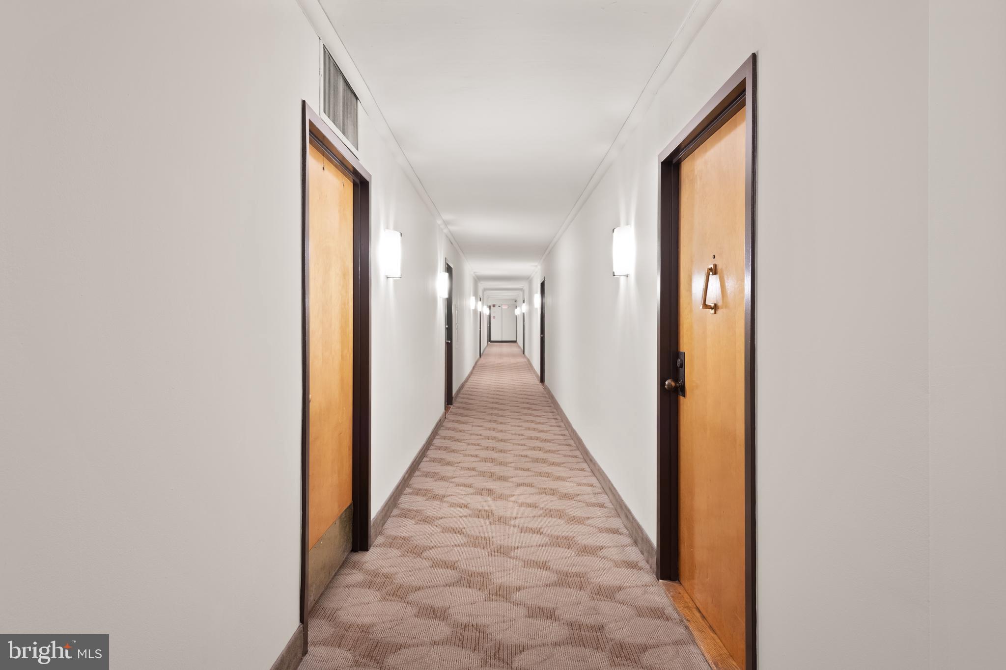 1245 13th Street Northwest, Unit 516 Washington, DC 20005 - Photo 7 of 25 a view of a hallway with wooden floor