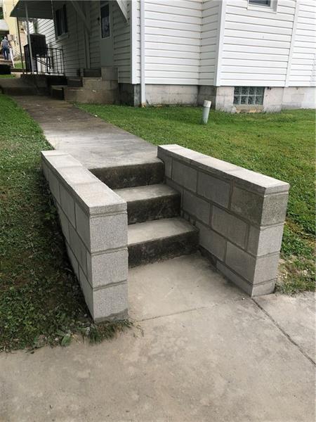22 Hemlock Street Ellsworth, PA 15331 - Photo 22 of 23 These walls around the steps are only days old