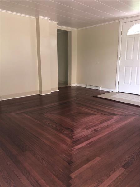 22 Hemlock Street Ellsworth, PA 15331 - Photo 8 of 23 Look how beautiful this floor is in the living room, it's gorgeous!