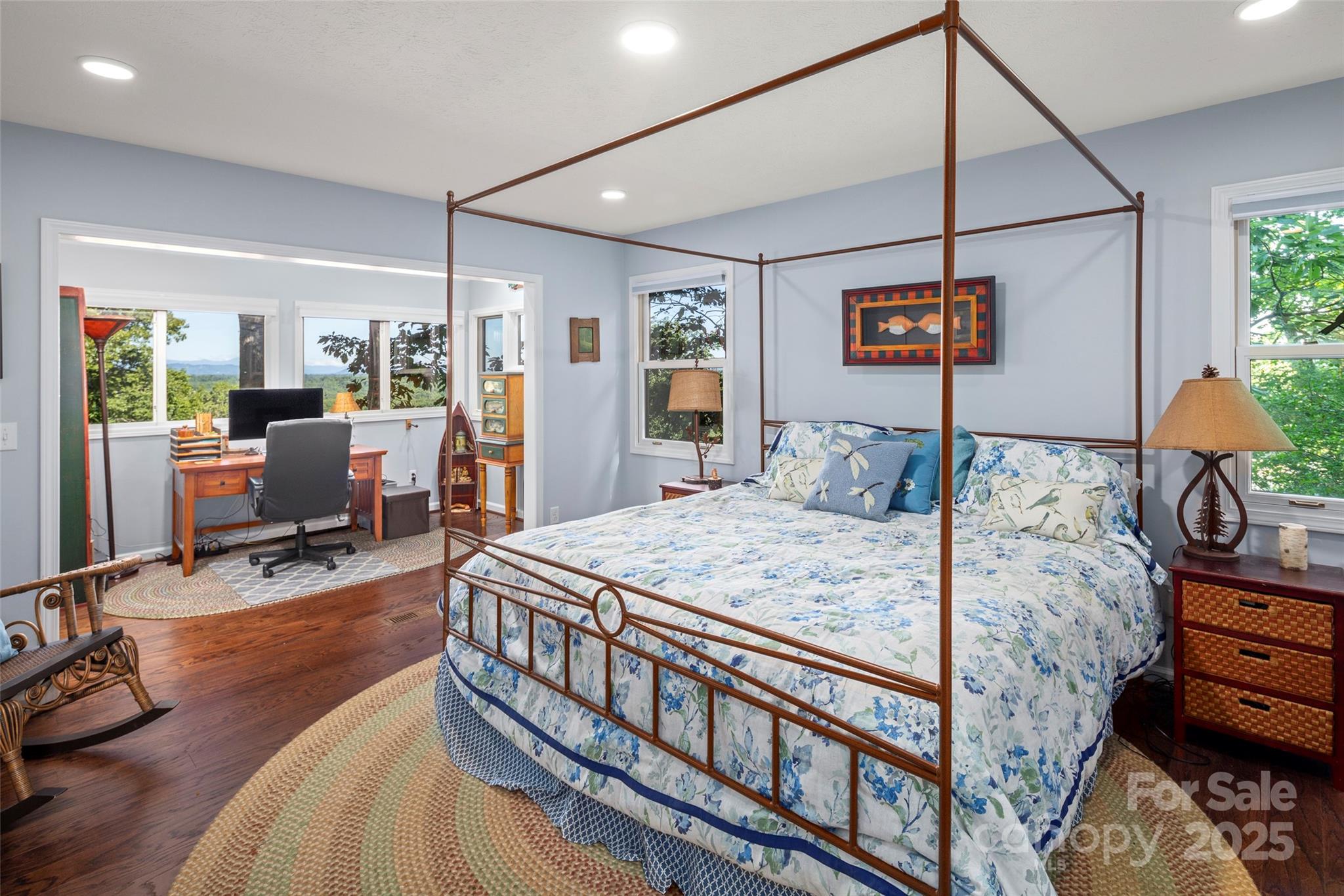 270 Ridge Drive Saluda, NC 28773 - Photo 24 of 32 a bedroom with bed and wooden floor