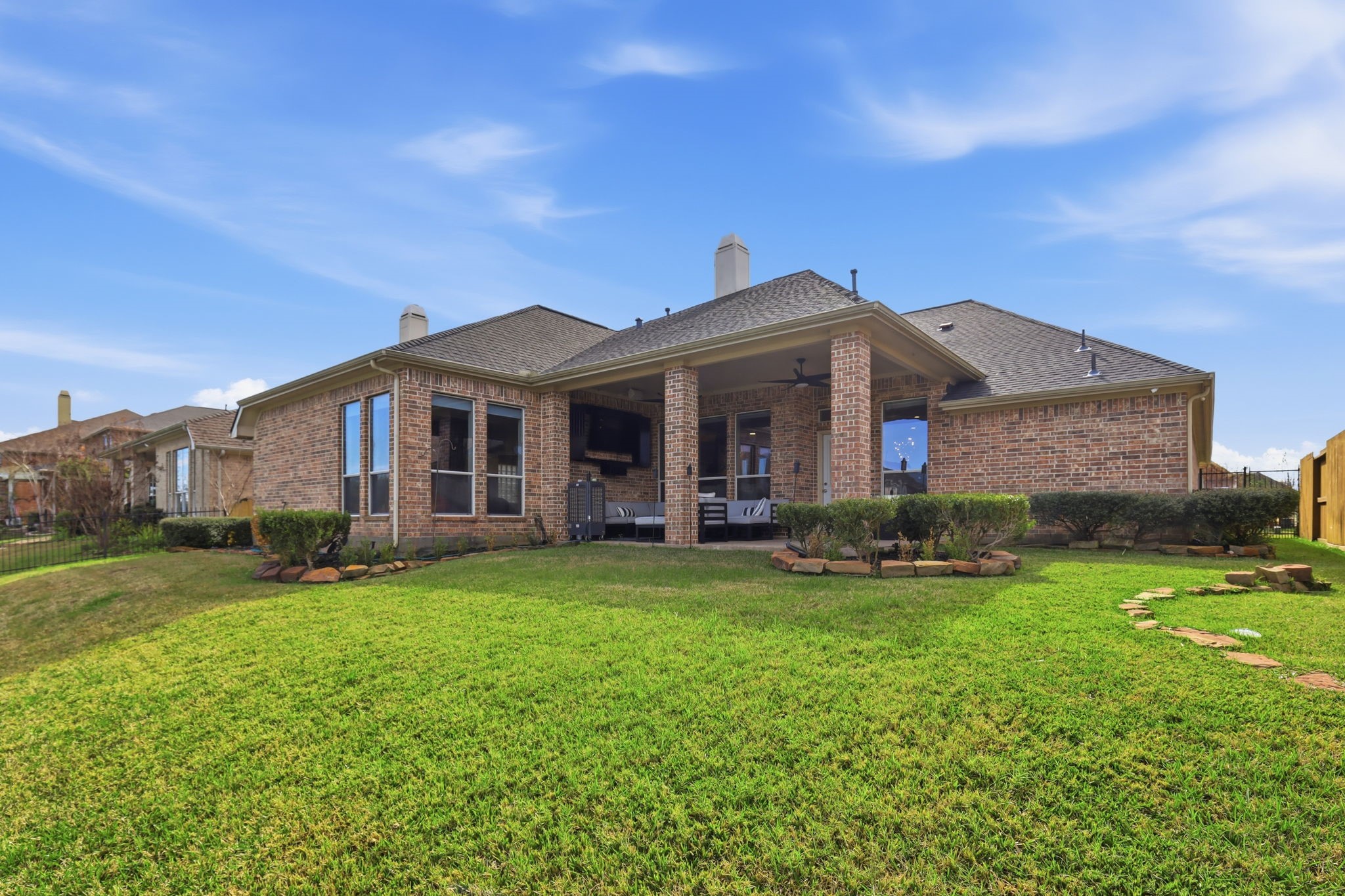 18014 Grotto Point Drive Cypress, TX 77429 - Photo 24 of 25 a front view of a house with garden