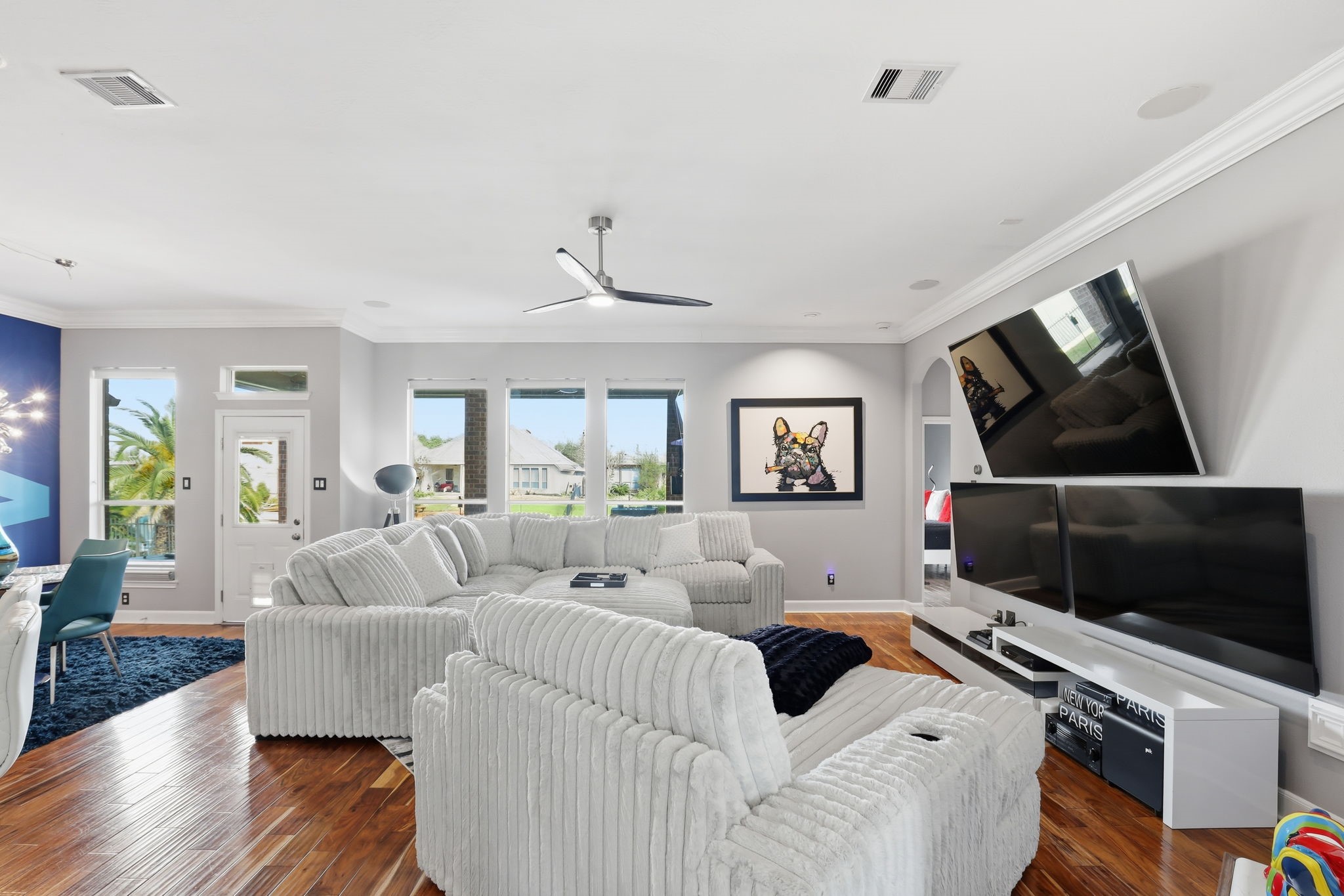 18014 Grotto Point Drive Cypress, TX 77429 - Photo 6 of 25 a living room with furniture and a flat screen tv