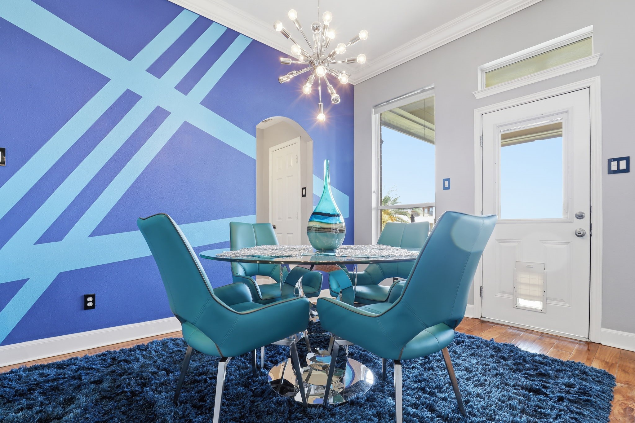 18014 Grotto Point Drive Cypress, TX 77429 - Photo 9 of 25 a view of a dining room with furniture and wooden floor