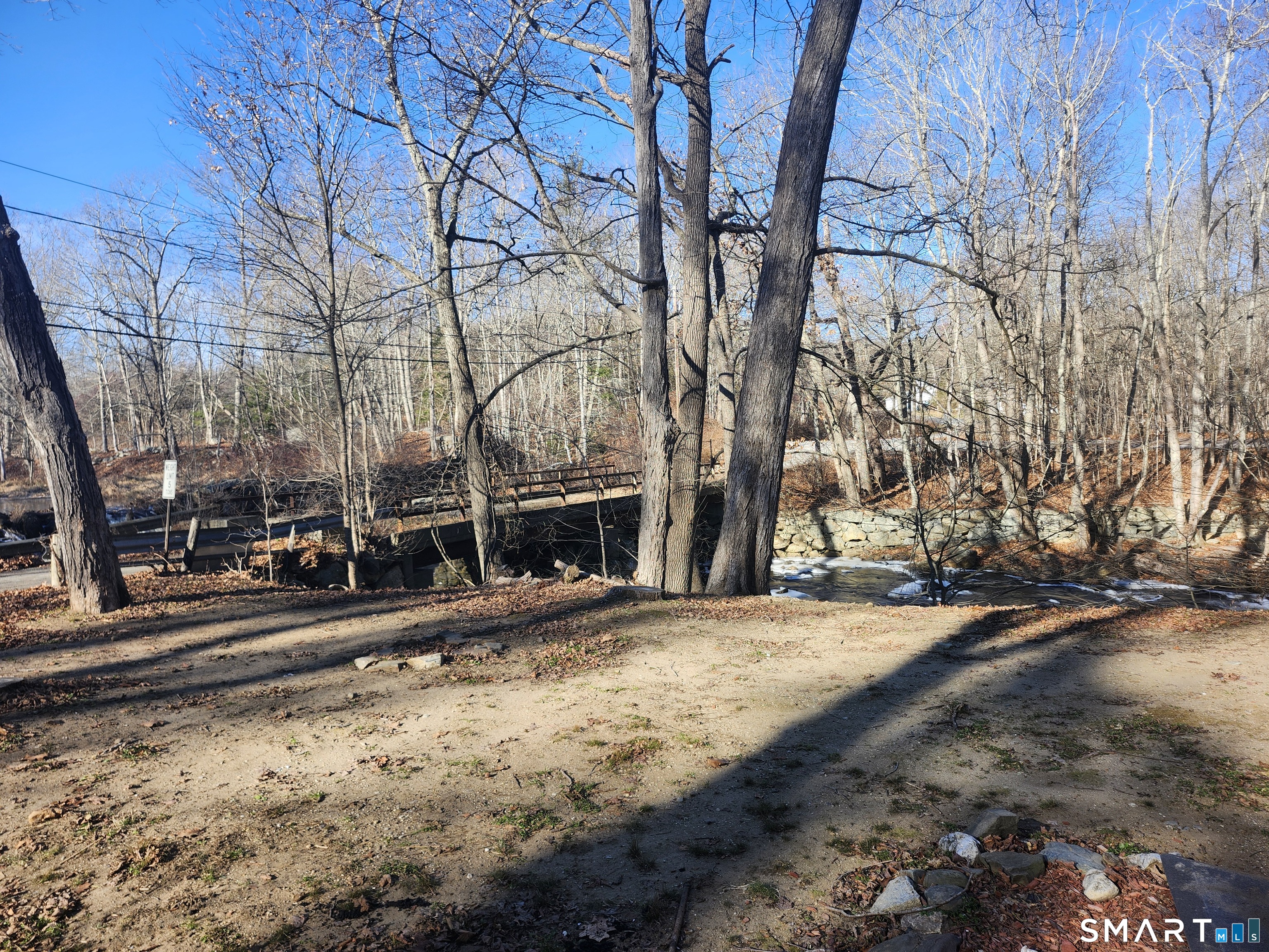 16 Polly Road, Unit A Lebanon, CT 06249 - Photo 8 of 9 a view of road with covered with snow
