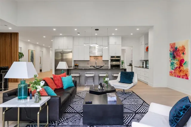 a kitchen with a dining table and chairs