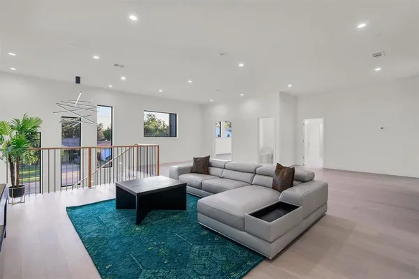 a living room with furniture and a table