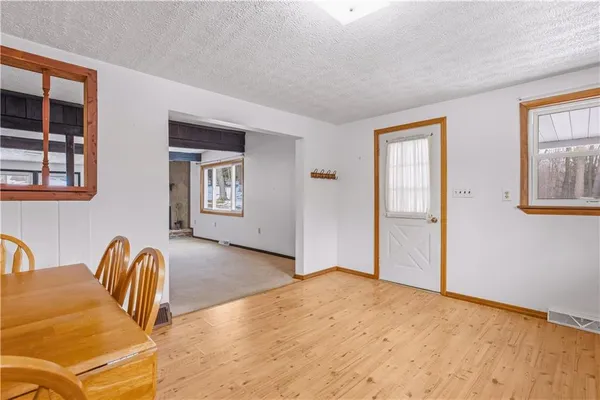 a view of a livingroom with furniture and window