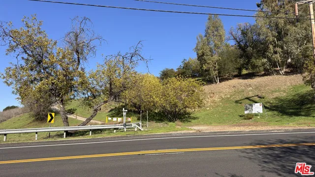 a view of a yard in front of a house