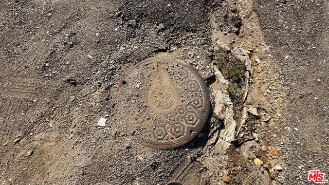 a view of a backyard of the house