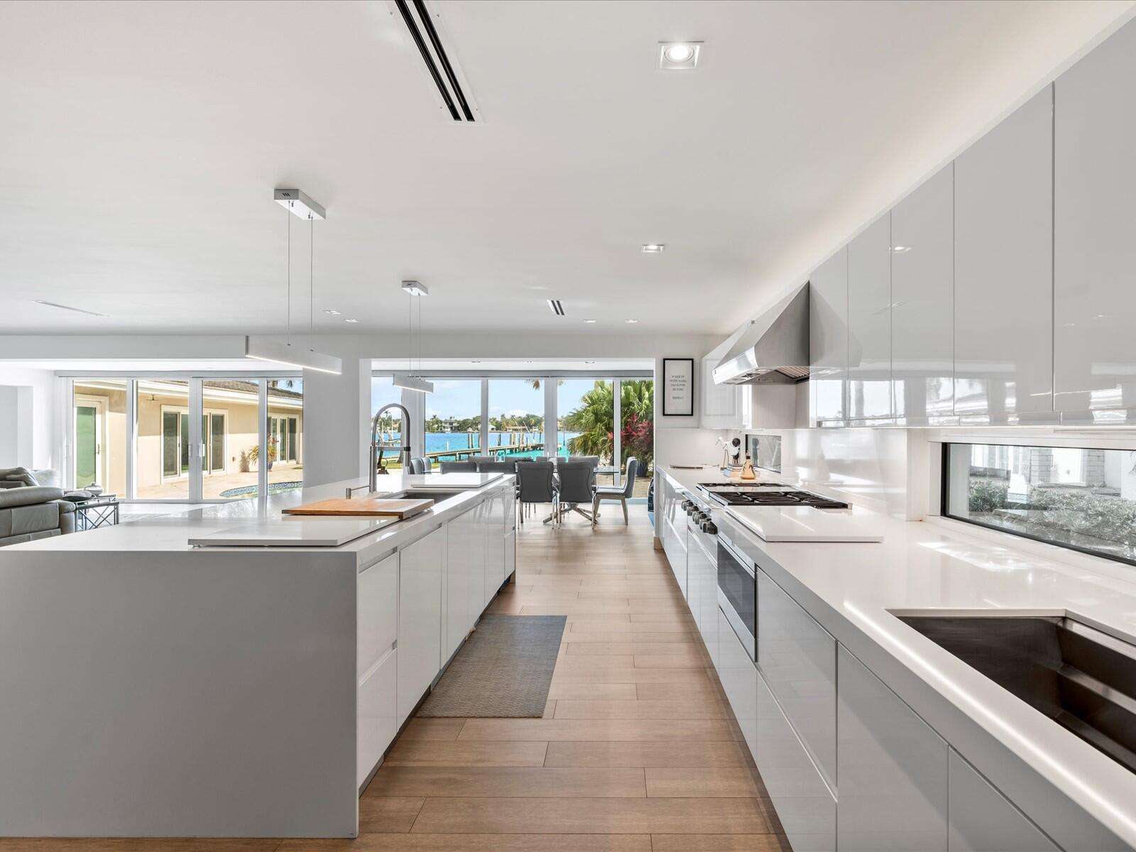 714 South Lake Drive Lantana, FL 33462 - Photo 12 of 41 a large kitchen with stainless steel appliances lots of counter top space