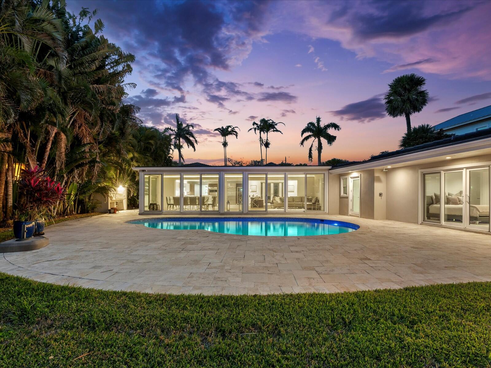 714 South Lake Drive Lantana, FL 33462 - Photo 29 of 41 a view of a house with a yard and balcony