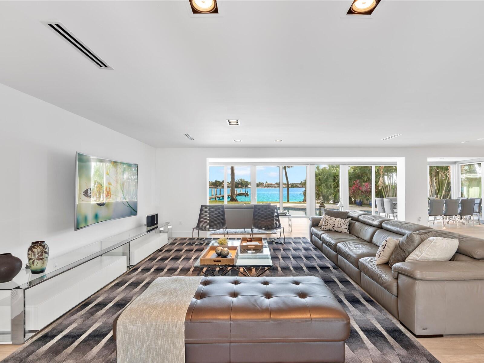 714 South Lake Drive Lantana, FL 33462 - Photo 3 of 41 a living room with furniture and a large window