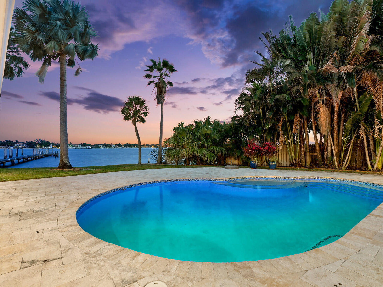 714 South Lake Drive Lantana, FL 33462 - Photo 32 of 41 a view of a swimming pool with an outdoor space and seating area