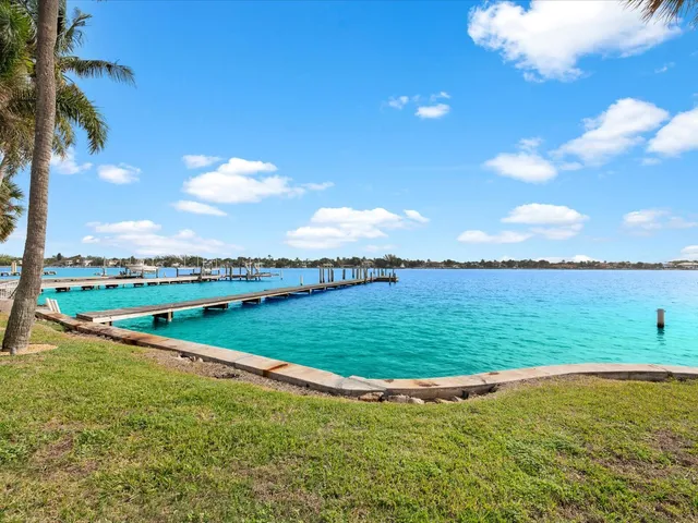 a view of a lake and a yard