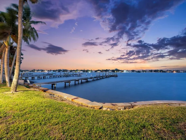 a view of a lake with a big yard