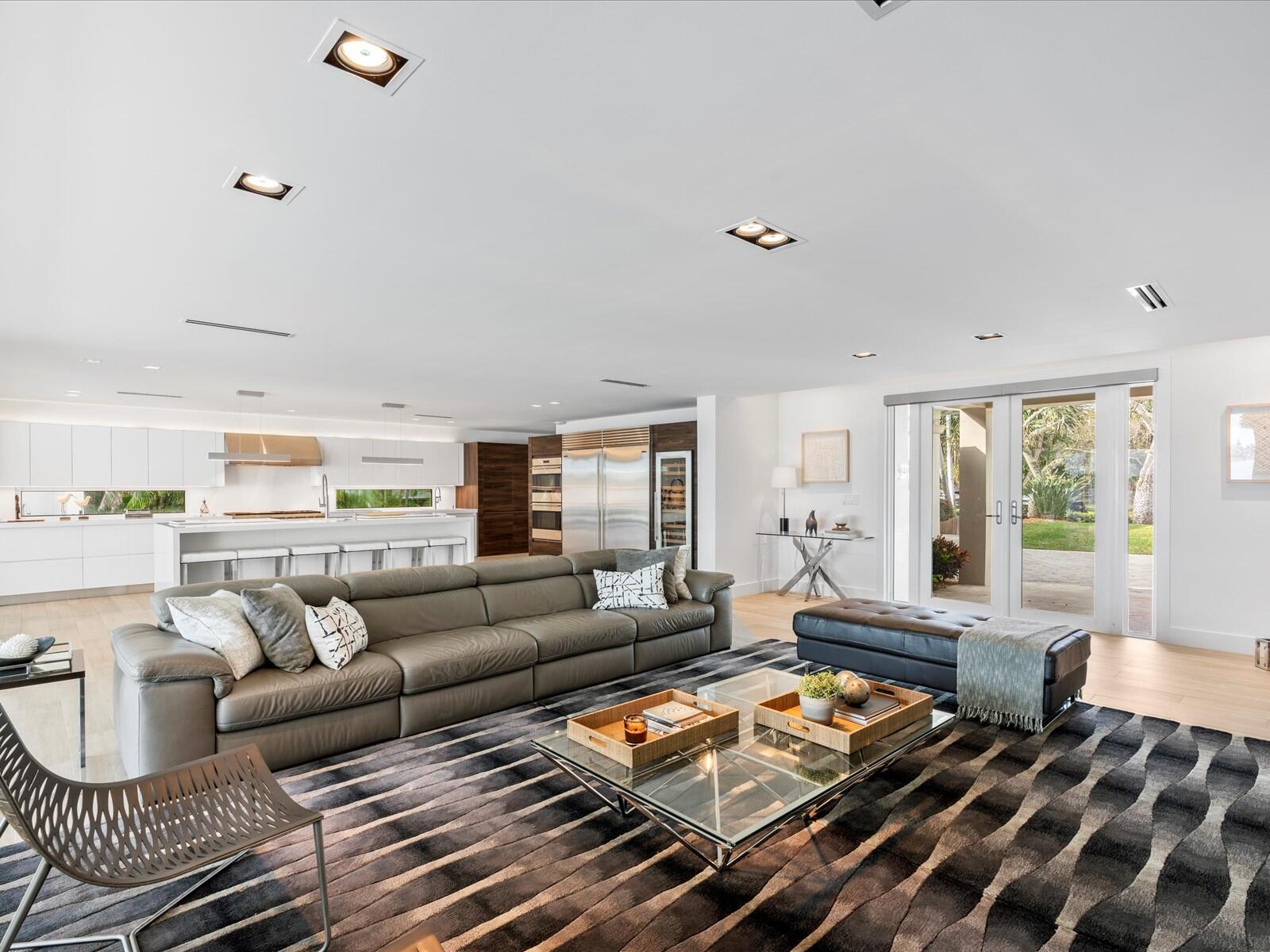 714 South Lake Drive Lantana, FL 33462 - Photo 6 of 41 a living room with furniture and a large window