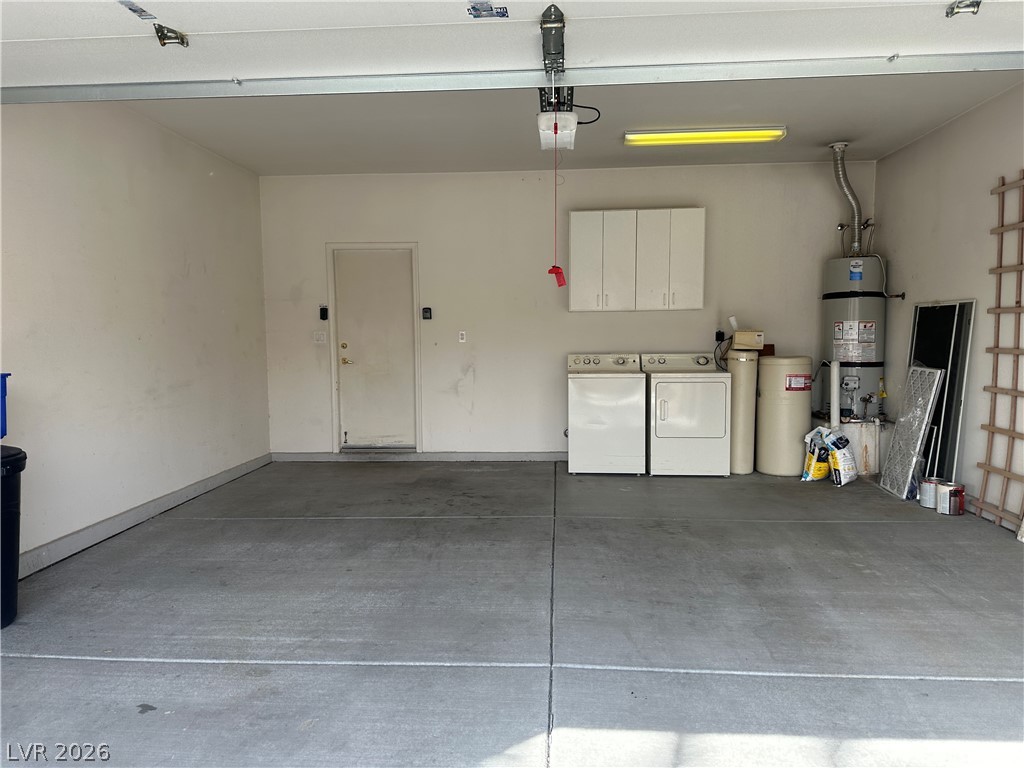 3034 Canal Walk Road Henderson, NV 89052 - Photo 3 of 24 This spacious garage offers abundant utility with laundry facilities and ample storage.