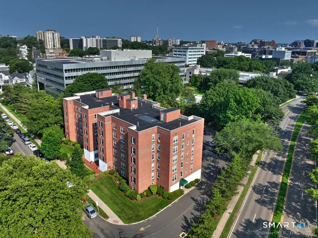 an aerial view of a house with outdoor space
