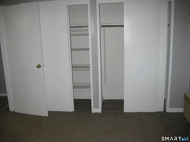 an empty room with closet