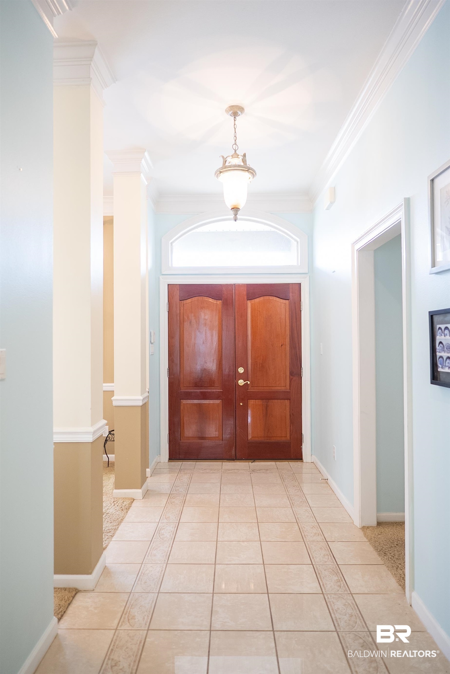 10023 Springfield Court Mobile, AL 36695 - Photo 7 of 50 Entryway featuring light tile patterned floors and ornamental molding
