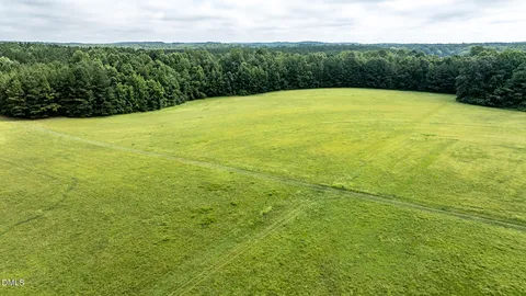 a view of a field with a yard