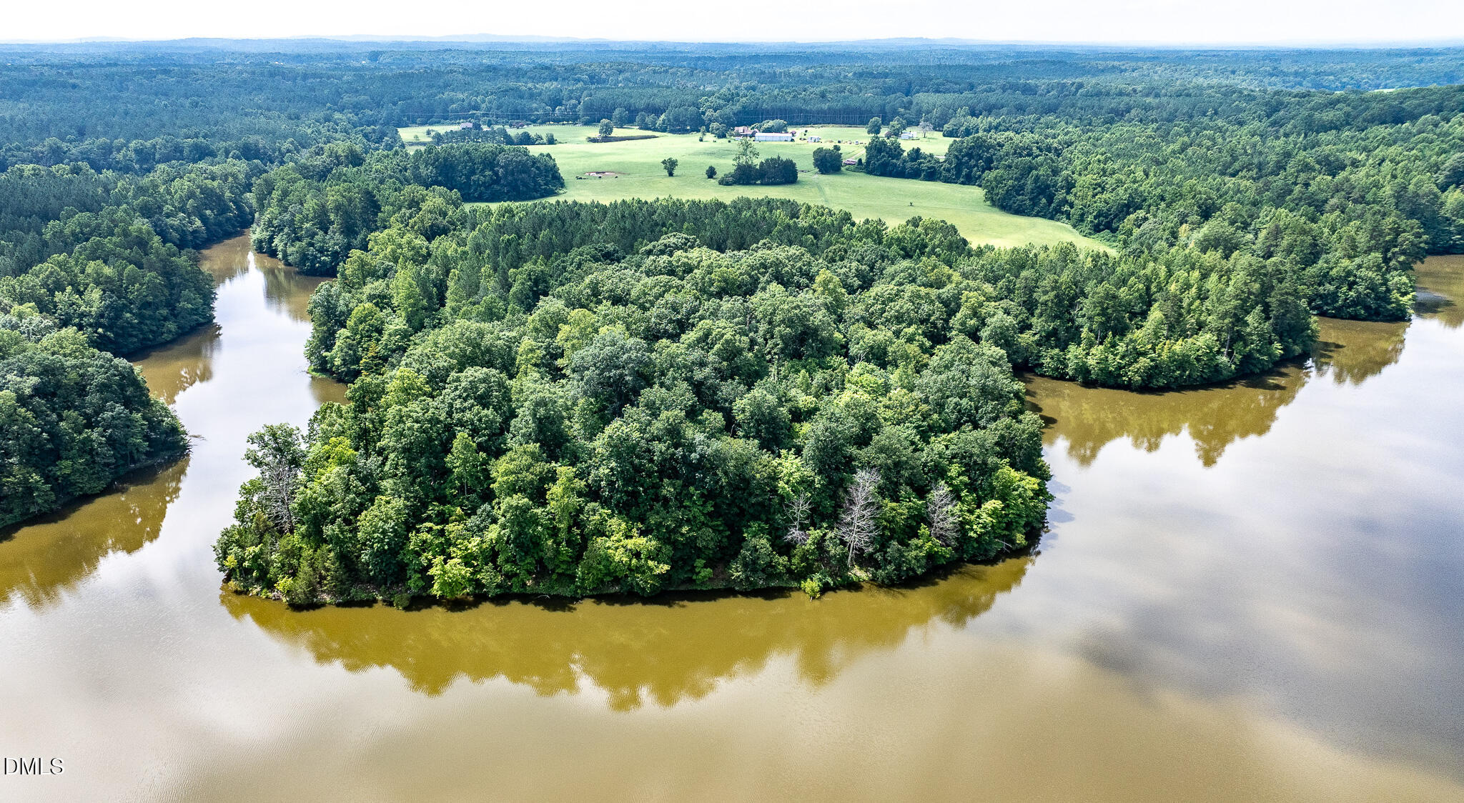 0 Teer Road Chapel Hill, NC 27516 - Photo 35 of 40 an aerial view of a house with a lake view