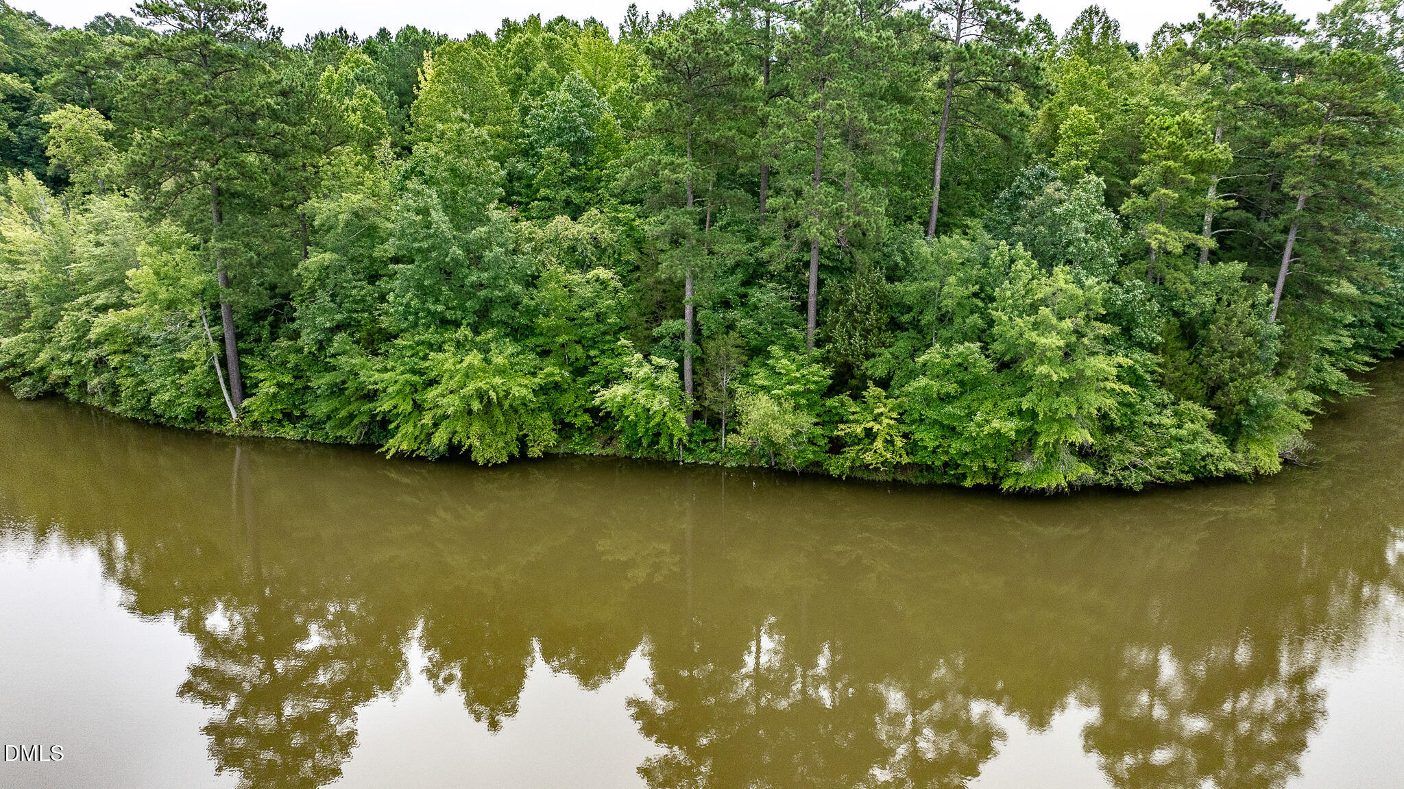 0 Teer Road Chapel Hill, NC 27516 - Photo 38 of 40 a view of a lake with a city