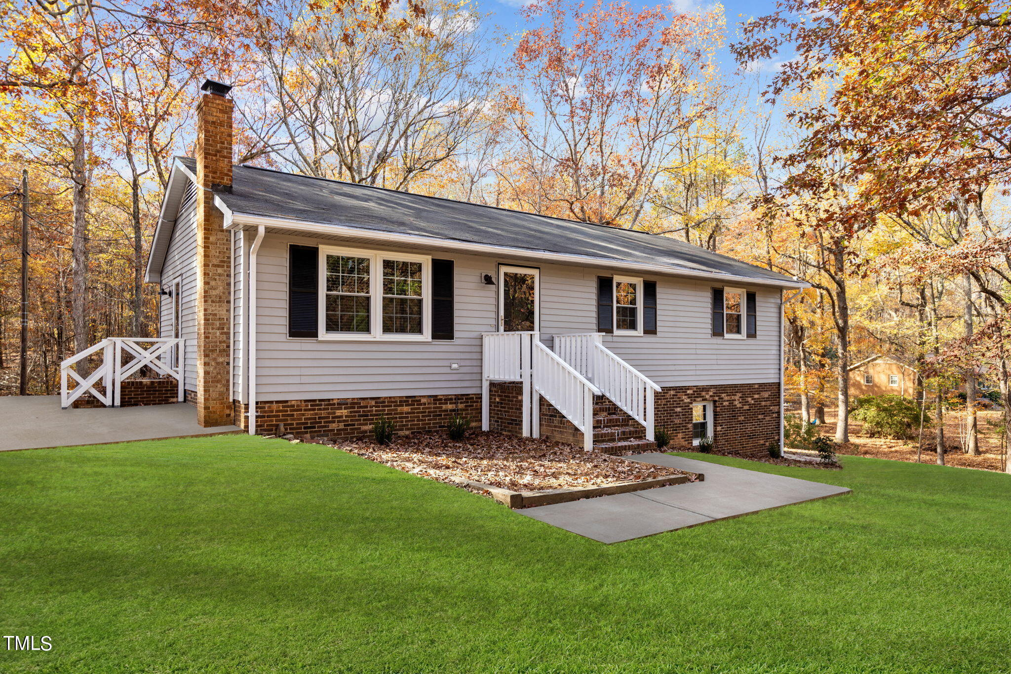 6415 Whitt Road Durham, NC 27712 - Photo 1 of 37 a house view with a garden space