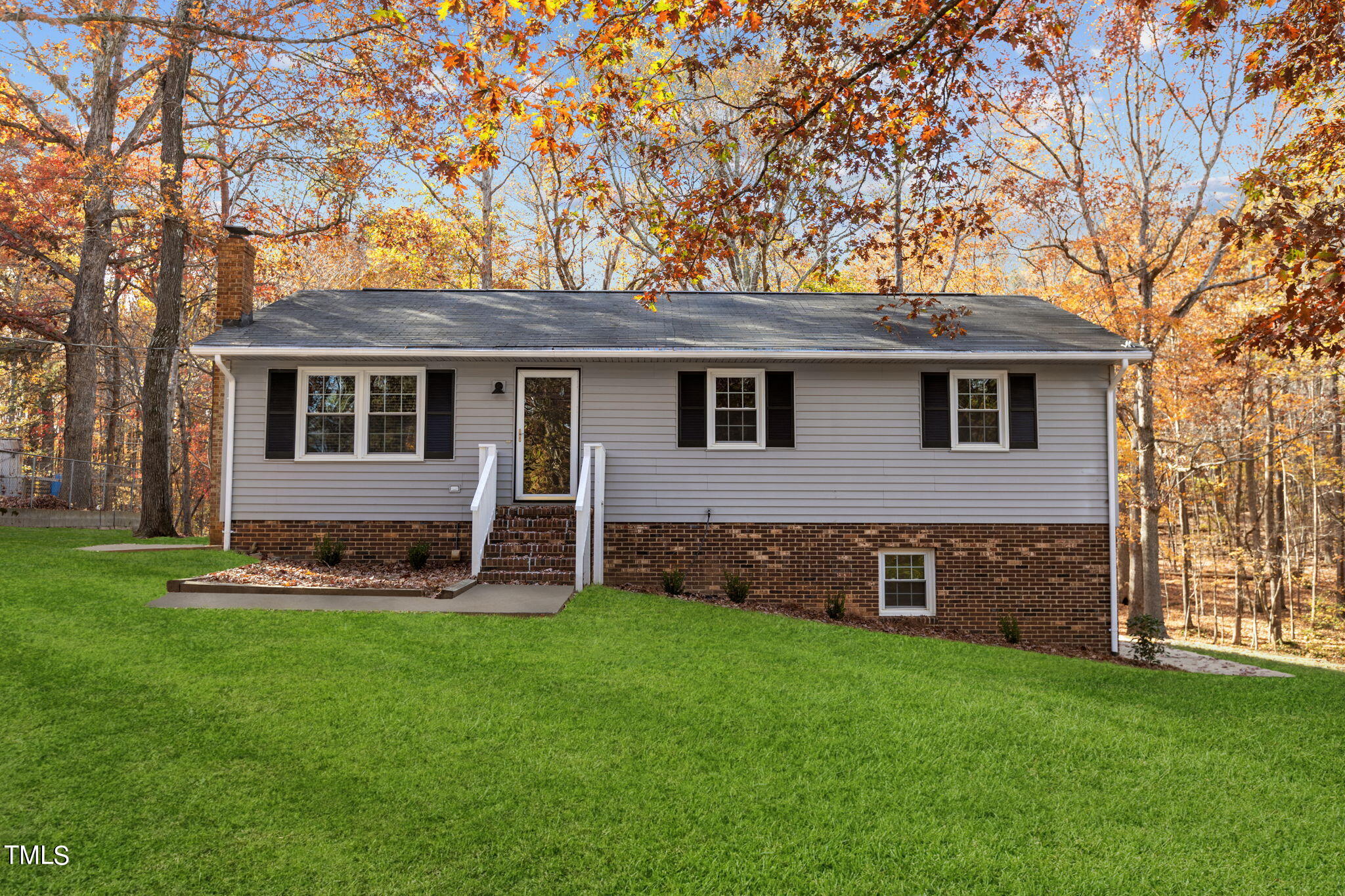 6415 Whitt Road Durham, NC 27712 - Photo 32 of 37 a front view of a house with a yard